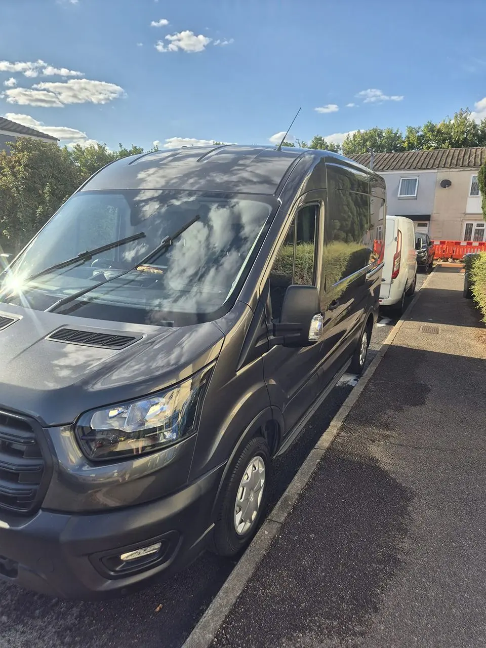 The grey VPA van parked at the kerb on a residential street